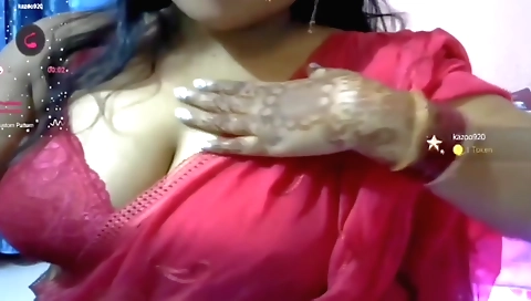 Indian brunette with big natural boobs showing off