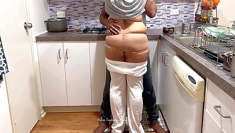 Indian chick with big booty gets fucked in the kitchen