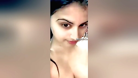 Indian girl is wearing sexy red dress and sexy breasts