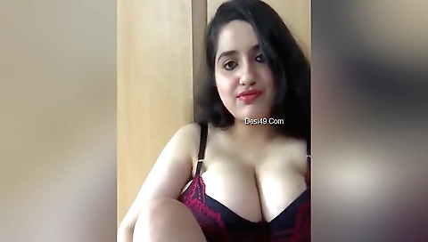 Indian brunette shows off her big tits in solo video