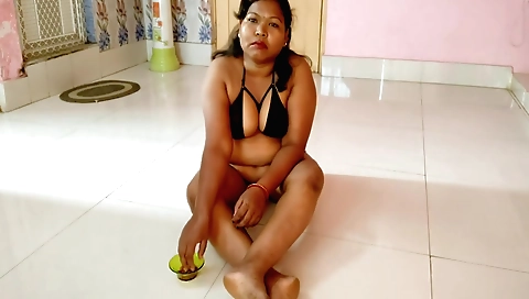 Amateur brunette in sexy outfit in a private bedroom