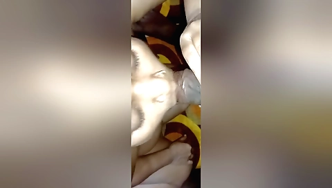 Hot brunette in a sexy outfit is showing off her mouth