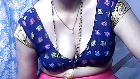 Indian solo female in a video of her showing her pussy