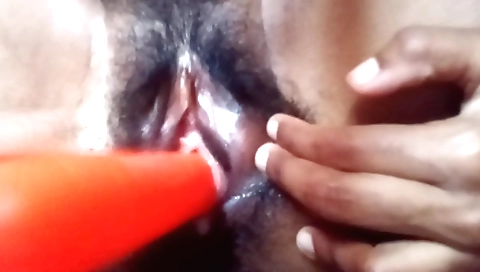 Indian housewife masturbates with a toy and a dildo