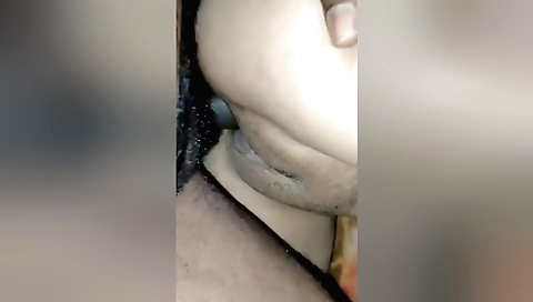 Busty brunette amateur bounces on her knee sucking on pussy