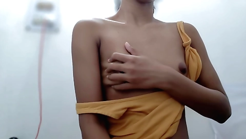 Busty brunette babe with a sexy face and a nice round booty