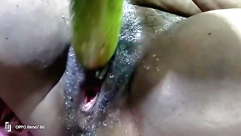 Hairy brunette babe in sexy lingerie plays with a big dildo