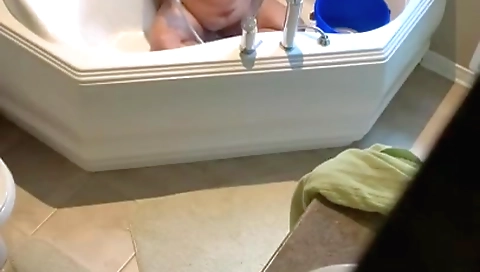 Indian brunette naked in the shower in sexy lingerie