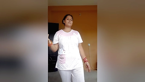 A sexy brunette in black stockings in a black dress