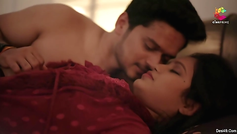 Bright tanned brunette moves around in her bedroom