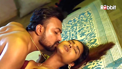 Brunette babe with short hair is playing with her toy