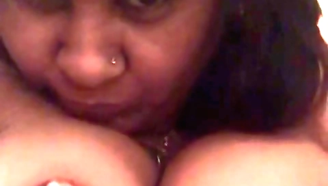 A brunette milf plays with her big boobs and a sexy pussy