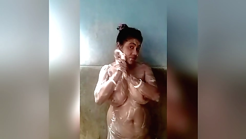 Busty brunette girl with big boobs is fingering herself