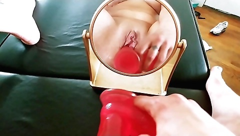 Solo girl with a sexy face has a huge dildo to fuck