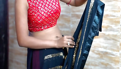 Indian babe in a sexy outfit is taking off her clothes