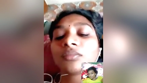 Busty brunette amateur girl in red dress on web cam