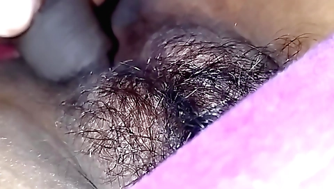 A hairy indian girl has a small body and a big dick